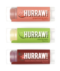 Hurraw! Grapefruit lip balm in an oval tube for zesty hydration.