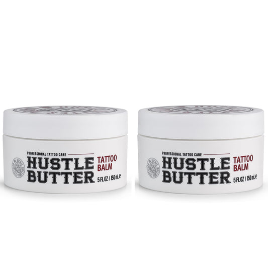 Hustle Butter Deluxe tattoo balm bottle close-up showing soothing lubrication during sessions