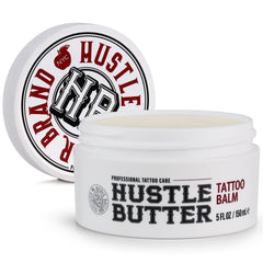 Hustle Butter Deluxe tattoo balm jar closeup showing creamy vegan formula for aftercare.