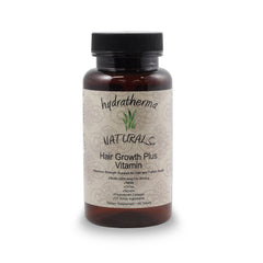 Hydratherma Naturals Hair Growth Plus bottle with water for convenient daily regimen.