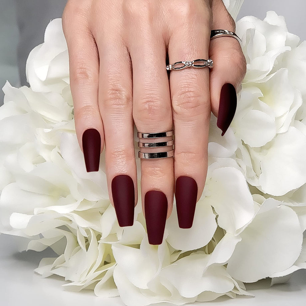 Hypnaughty coffin nails shown with file and prep for customized length.