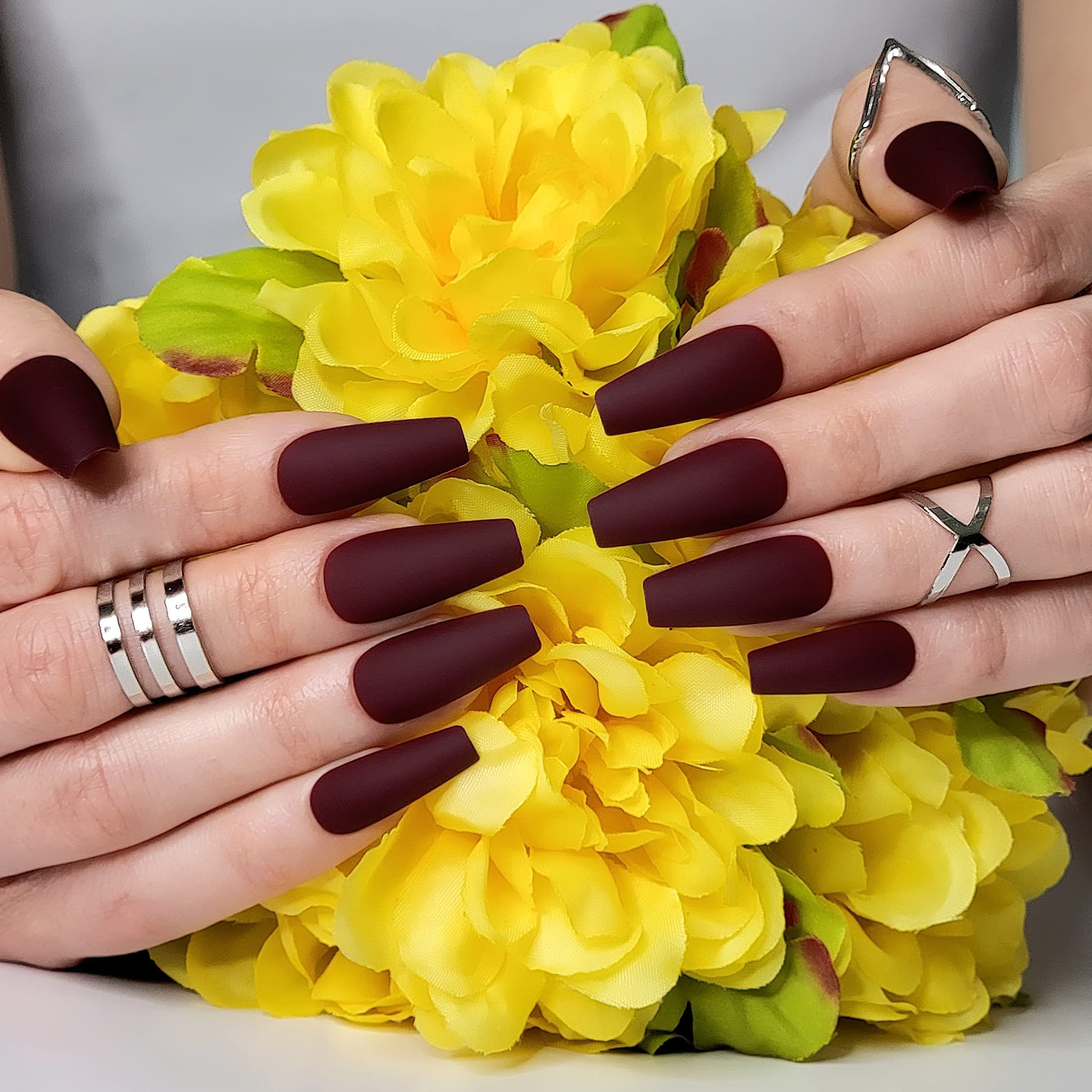 Hypnaughty maroon xtreme matte coffin nails with included glue for quick wear.