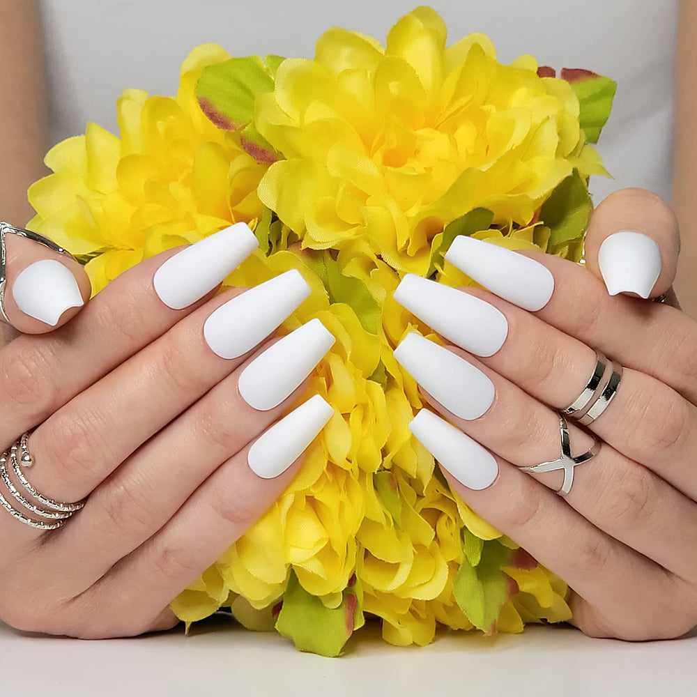 Hypnaughty Santorini nails with file and top coat ready for application