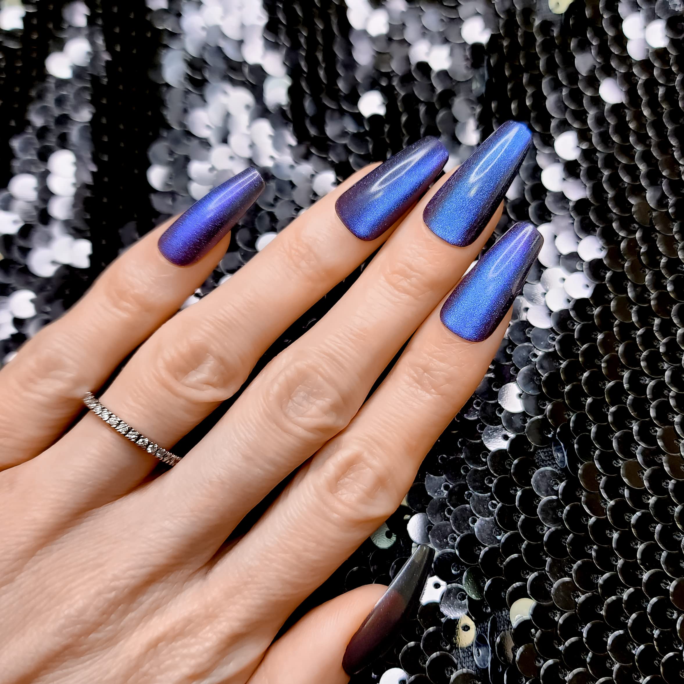 Hypnaughty Stardust Cat Eye sparkle close-up showcases color shift.