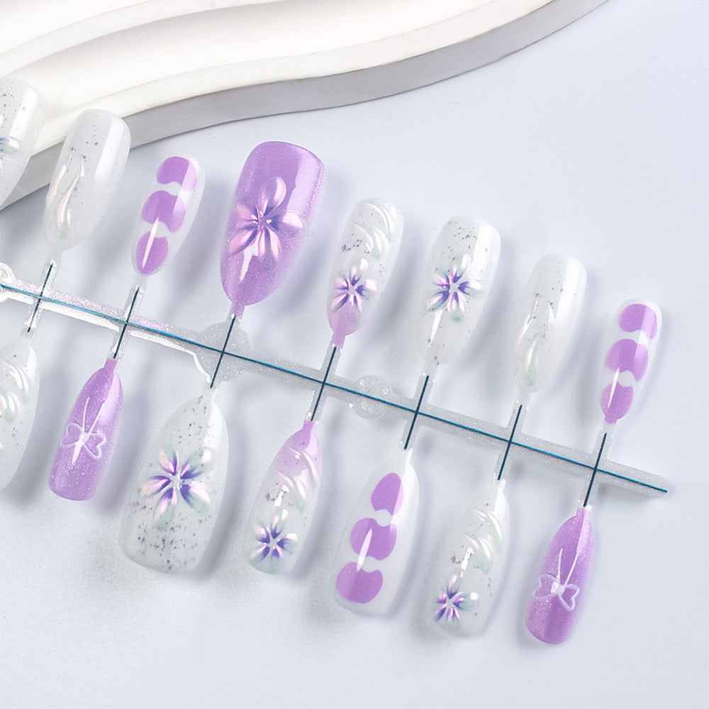 HZJXRT 3D flower details on nails for a delicate date-night look.