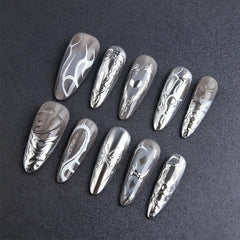 HZJXRT 3D love heart nails with butterfly accents for date-night style.