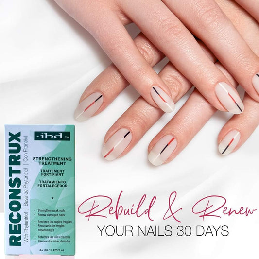 Close-up of the Reconstrux brush applying treatment to a nail