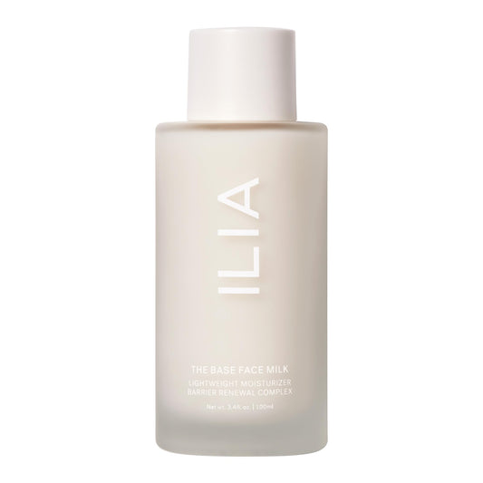 ILIA Base Face Milk Essence bottle closeup shows hydrating formula for daily use
