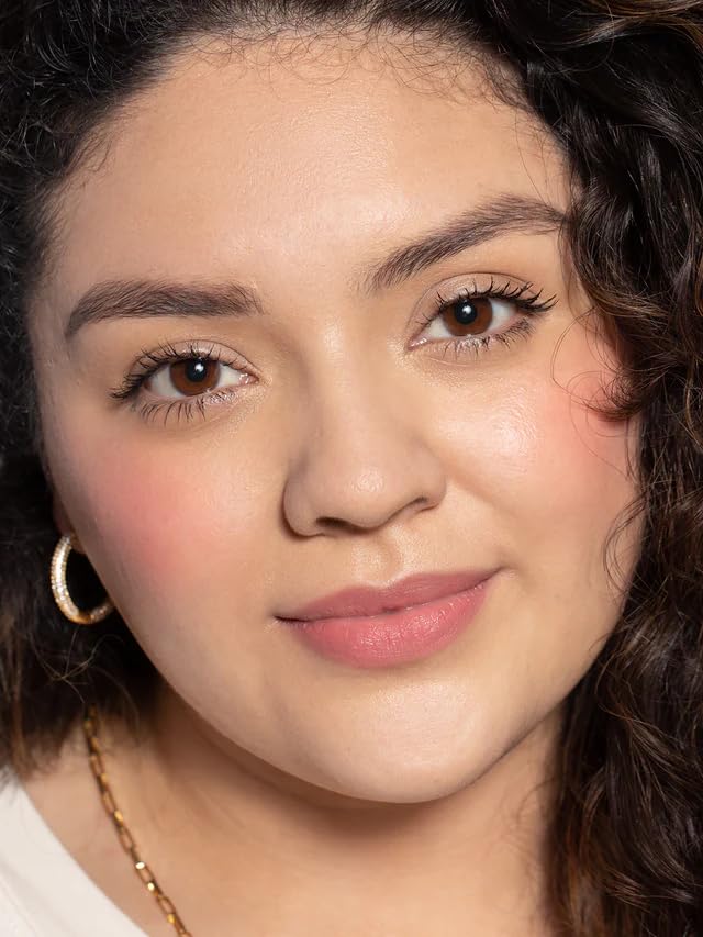 ILIA Color Haze Temptation Soft coral-pink shade swatch on lips.