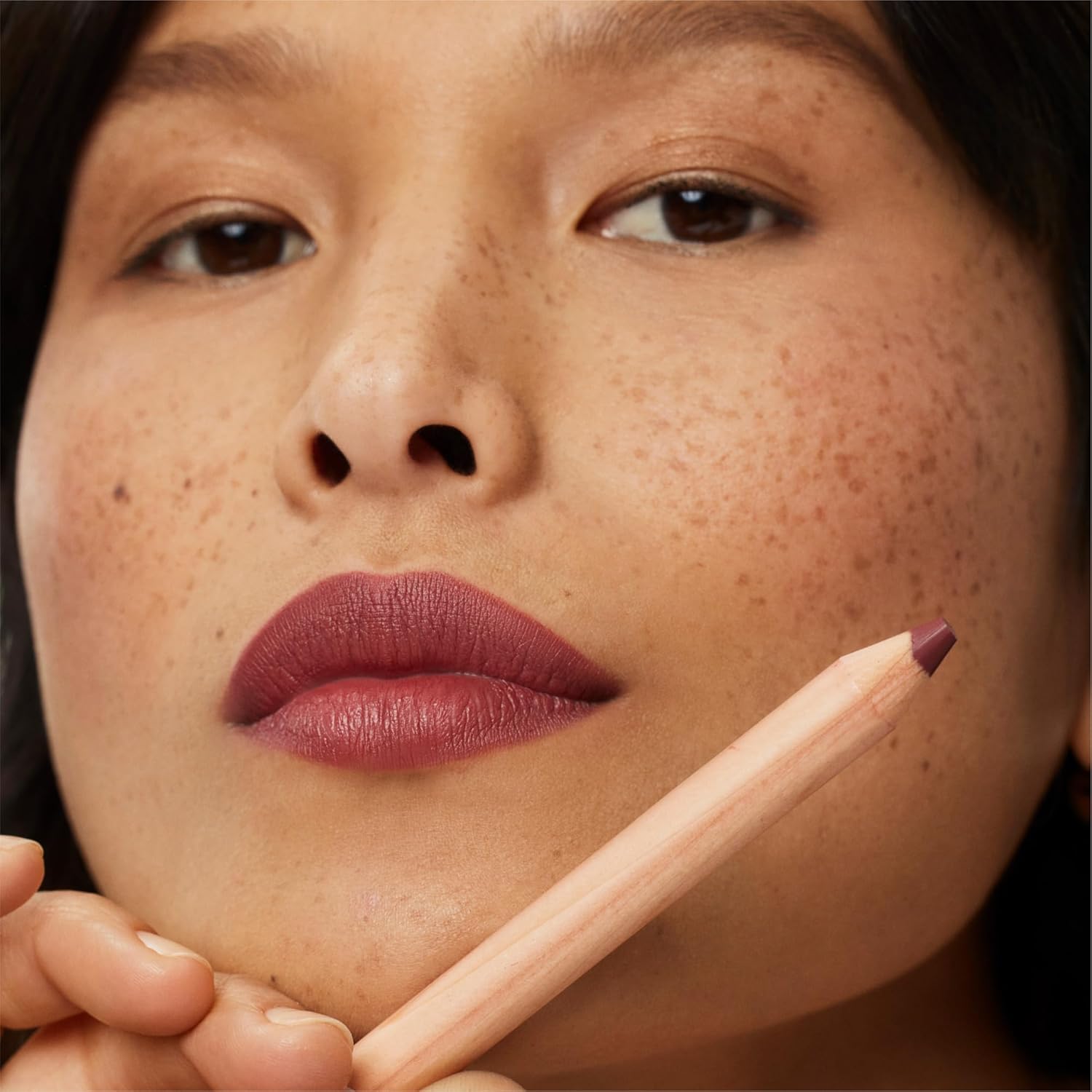 ILIA Lip Sketch Gala on lips illustrating even application and defined lip line.