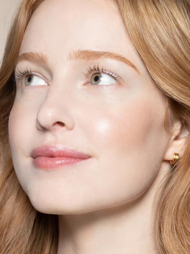 Apply with fingers for seamless lip and cheek blend.