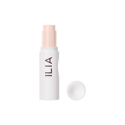 ILIA Skin Rewind Complexion Stick packaging close-up highlighting vegan, clean makeup credentials.