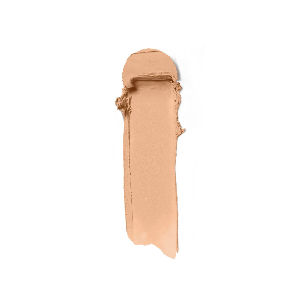 Close-up swatch on skin showing natural-matte finish and seamless blend