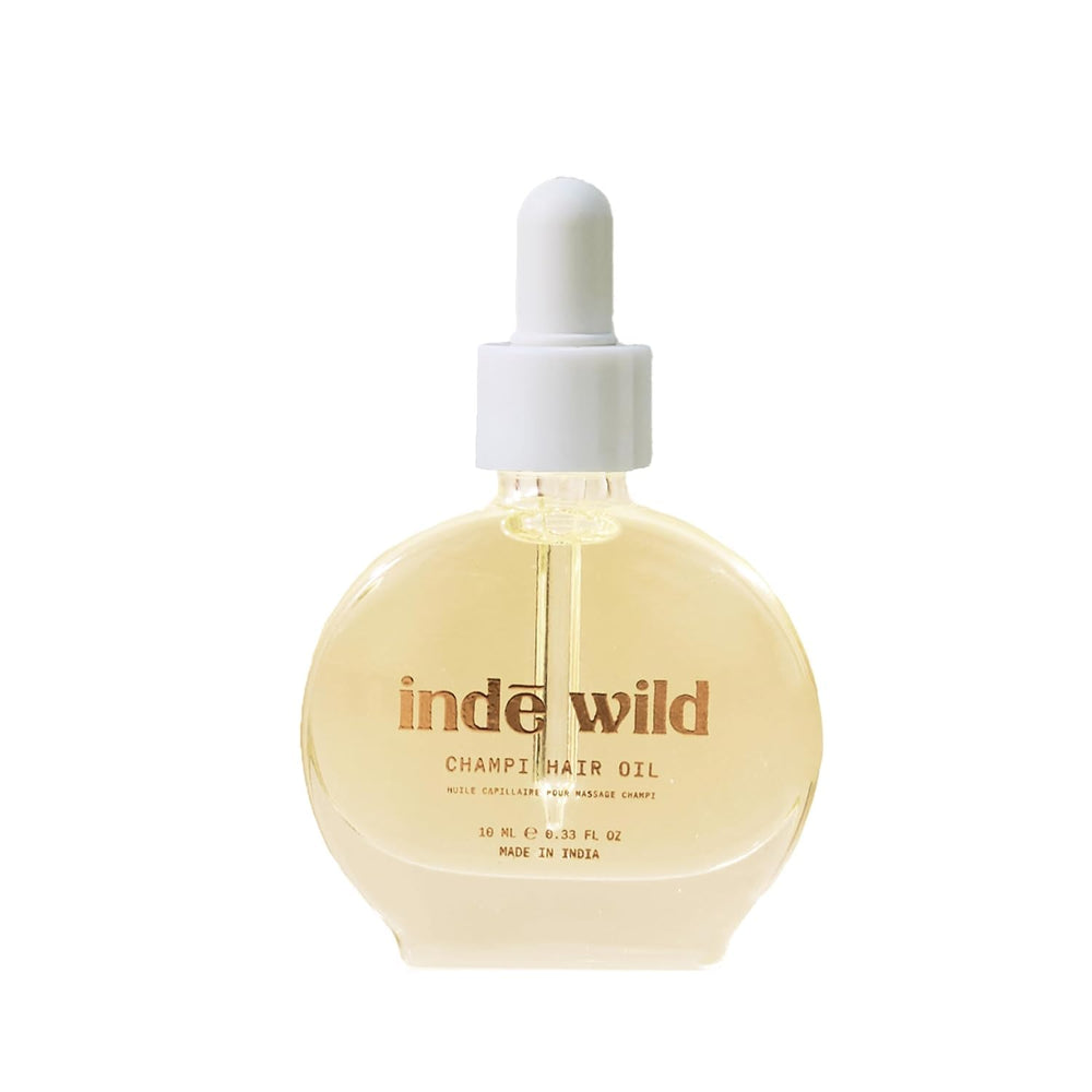 Inde Wild Champi Ayurvedic Hair Oil bottle pour for daily use