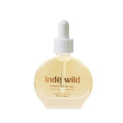 Inde Wild Champi Ayurvedic Hair Oil bottle pour for daily use