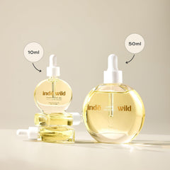 Inde Wild Champi Ayurvedic Hair Oil applying to scalp with gentle massage