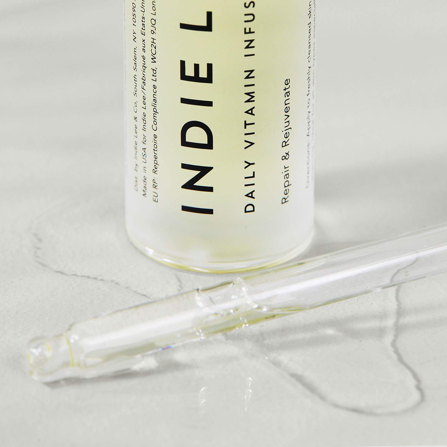 Indie Lee Daily Vitamin Infusion packaging on display emphasizes clean skincare