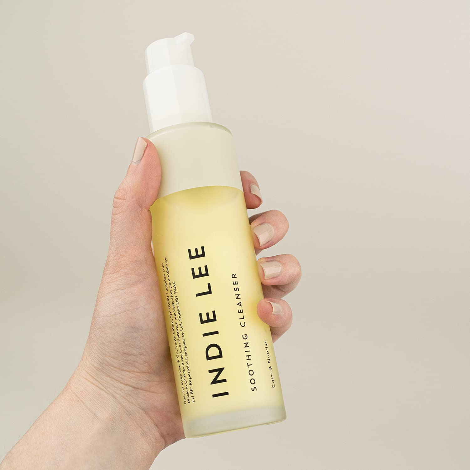 Indie Lee Rose Damascena oil bottle, nourishing aroma for daily skincare ritual.