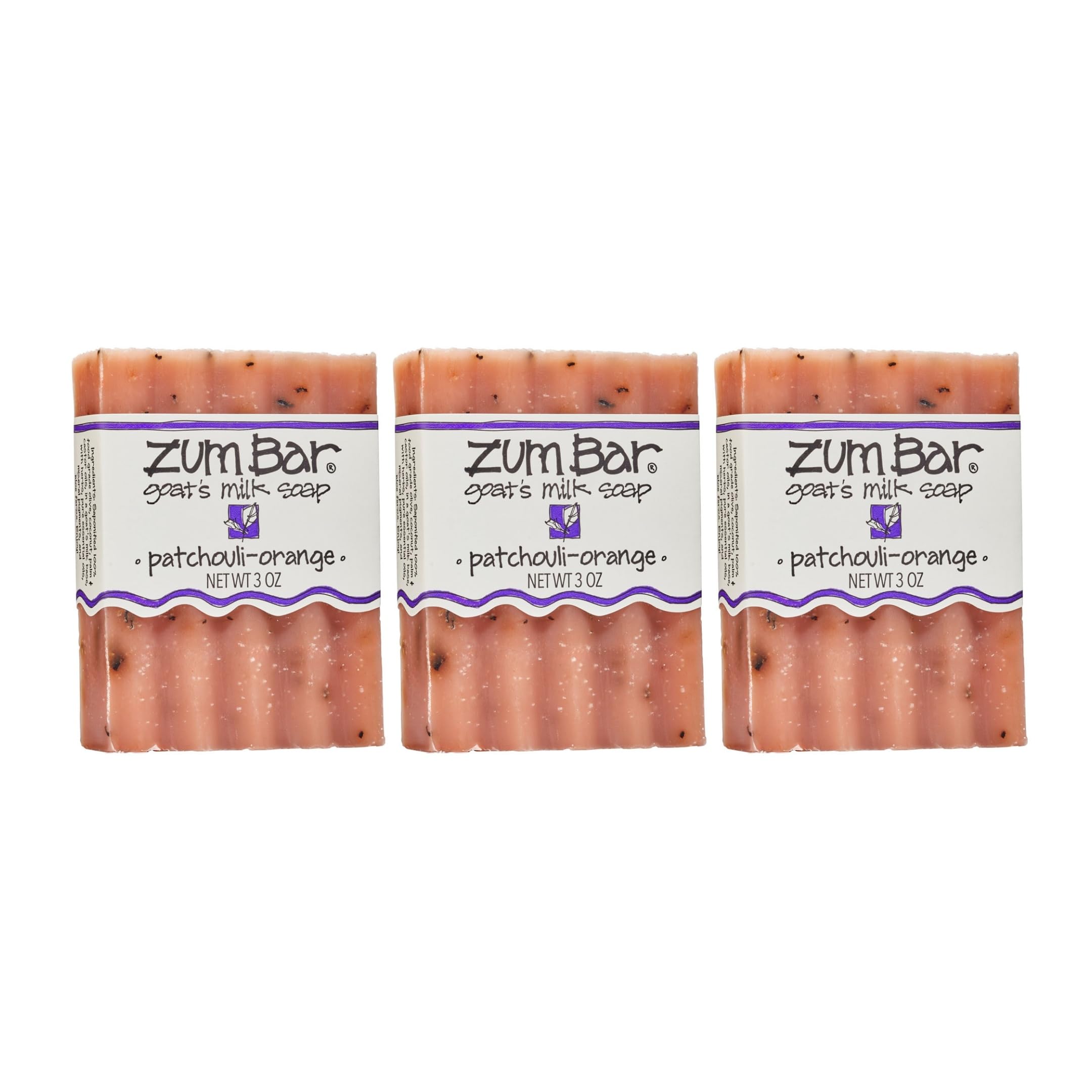 Indigo Wild Zum goat milk soap bar patchouli-orange unwrapped for a rich, nourishing cleanse.