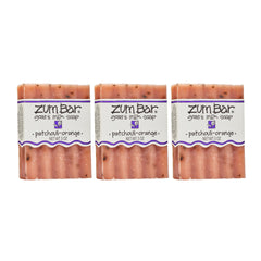 Indigo Wild Zum goat milk soap bar patchouli-orange unwrapped for a rich, nourishing cleanse.