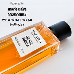 INDIRA SAN FRANCISCO Cognac Vanilla bottle top with premium cap and amber liquid.