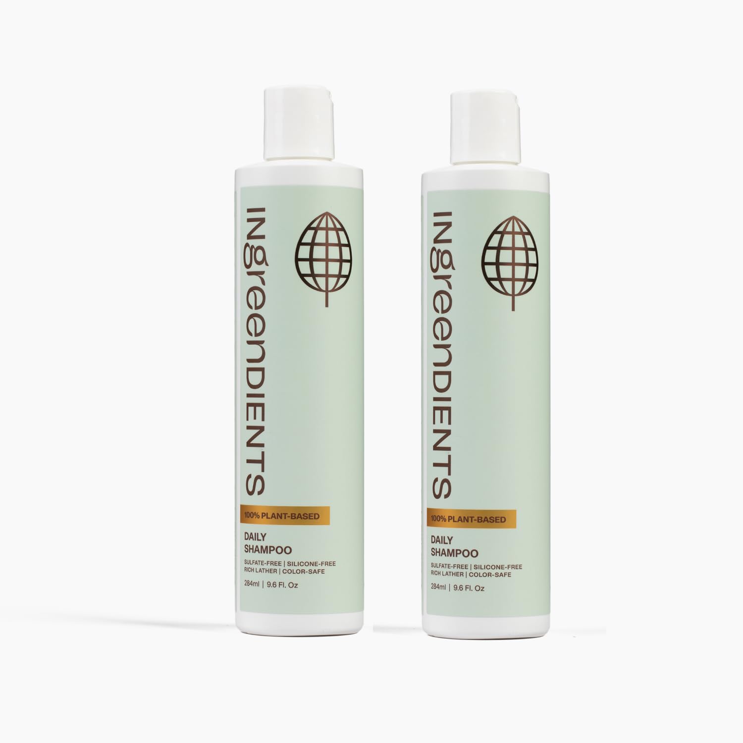 Ingreendients non-toxic vegan shampoo bottle on shelf for gentle daily cleansing.