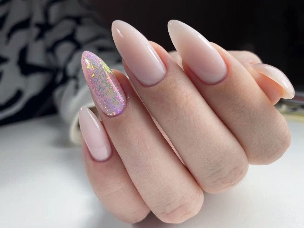 IN.HYPE Baby Pink Builder Gel finished nails with smooth, durable shine.