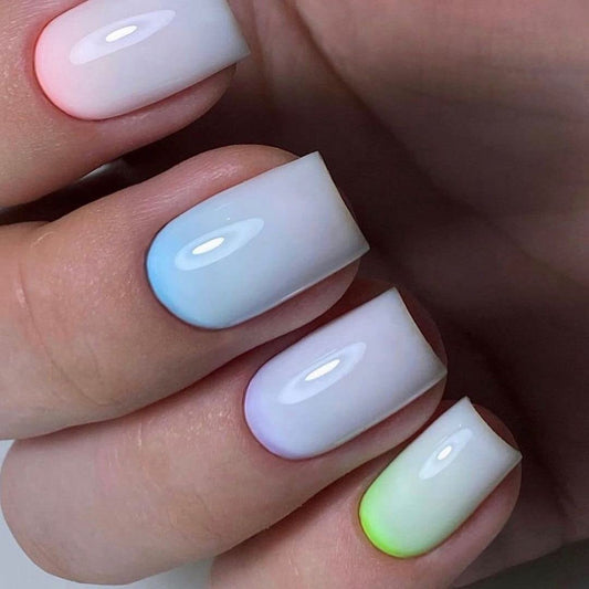 IN.HYPE Gel Cover Top Coat Milky brush stroke demonstrates subtle tint and even application.