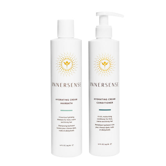 INNERSENSE Organic Hydrating Hairbath bottle pour, showcasing rich conditioning lather.