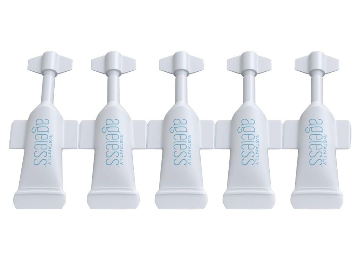 Instantly Ageless face lift cream tube close-up for brightening daily eye care.