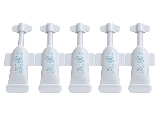 Instantly Ageless face lift cream tube close-up for brightening daily eye care.