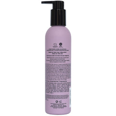Intelligent Nutrients Fortifi-hair Conditioner being poured for detangling prep.