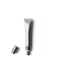 Intense Lip Plumper Gloss Crystal Clear bottle closeup showing plumping formula