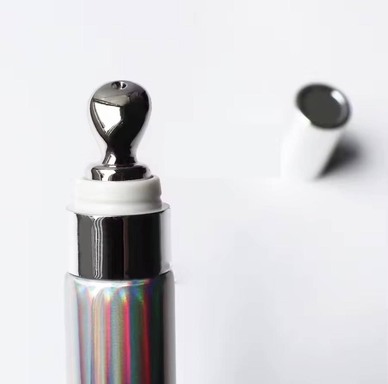 Intense Lip Plumper Gloss wand application demonstrating quick lift