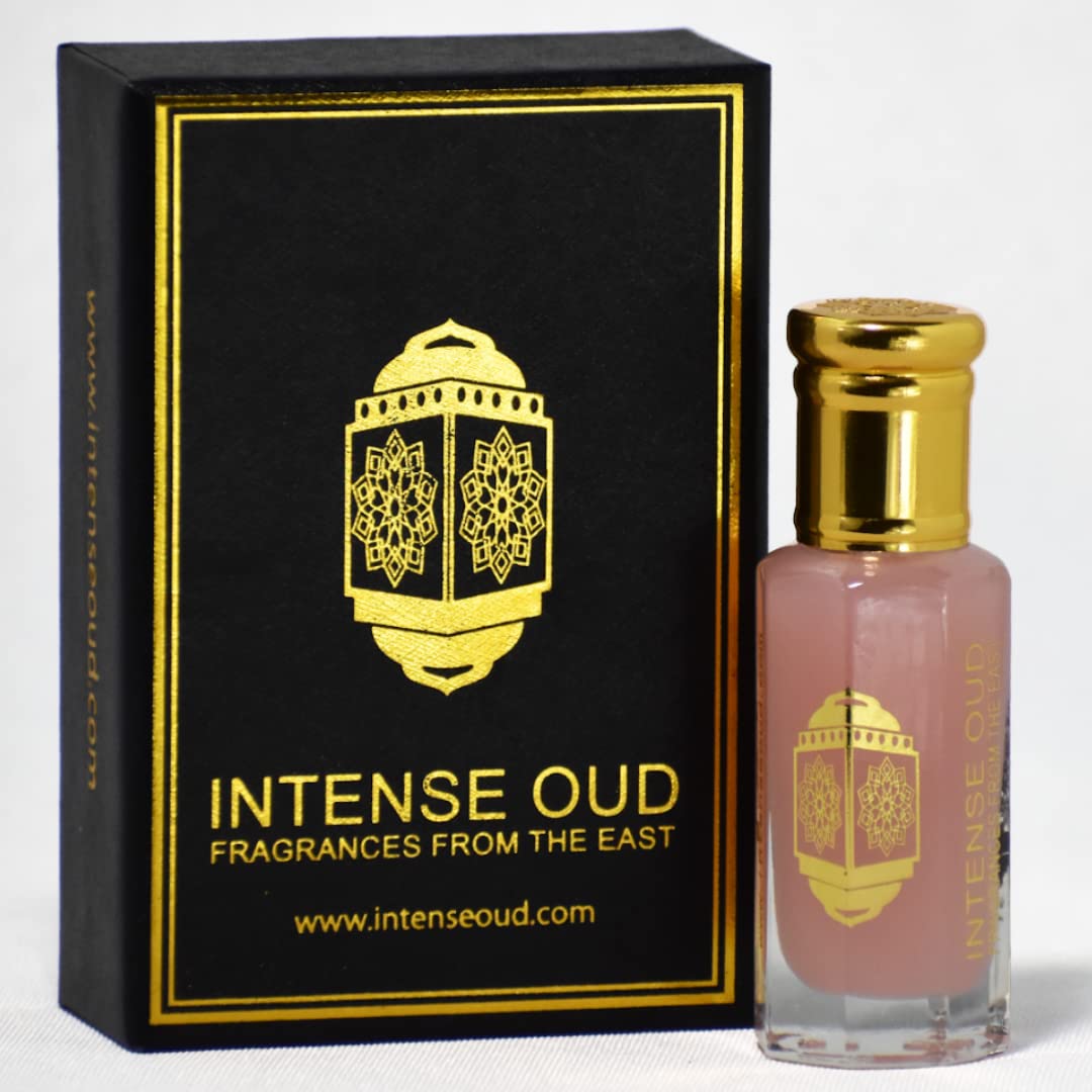 INTENSE OUD Pink Musk bottle close-up highlighting premium perfume oil with lasting scent.