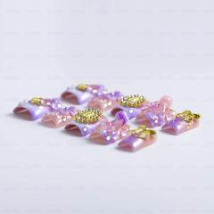 IntoVibes 3D flowers and lollipops nails elevate party-ready manicures.