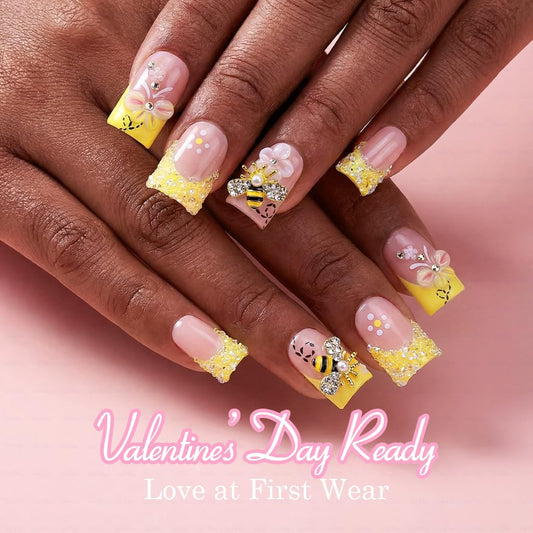 IntoVibes butter yellow press-on nails for a bold, glossy finish.