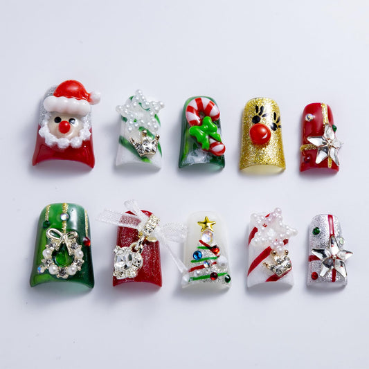 IntoVibes Christmas duck nails in red and green for festive daily wear.