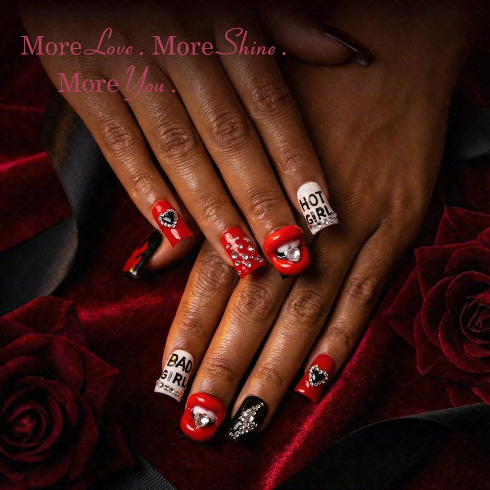 IntoVibes black flame nails with glitter add bold accents.