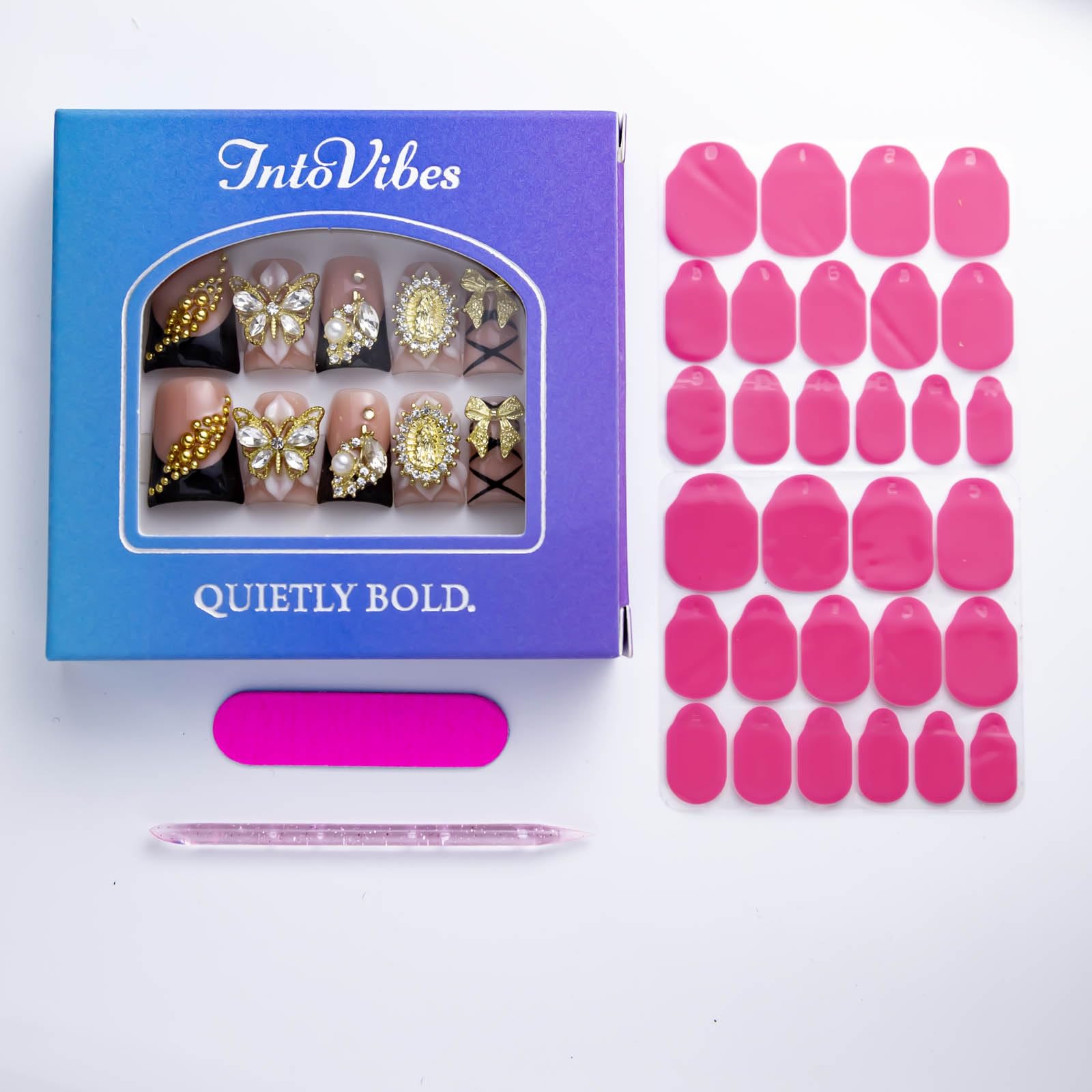 IntoVibes nail set includes gold butterflies and bows for festive styling.