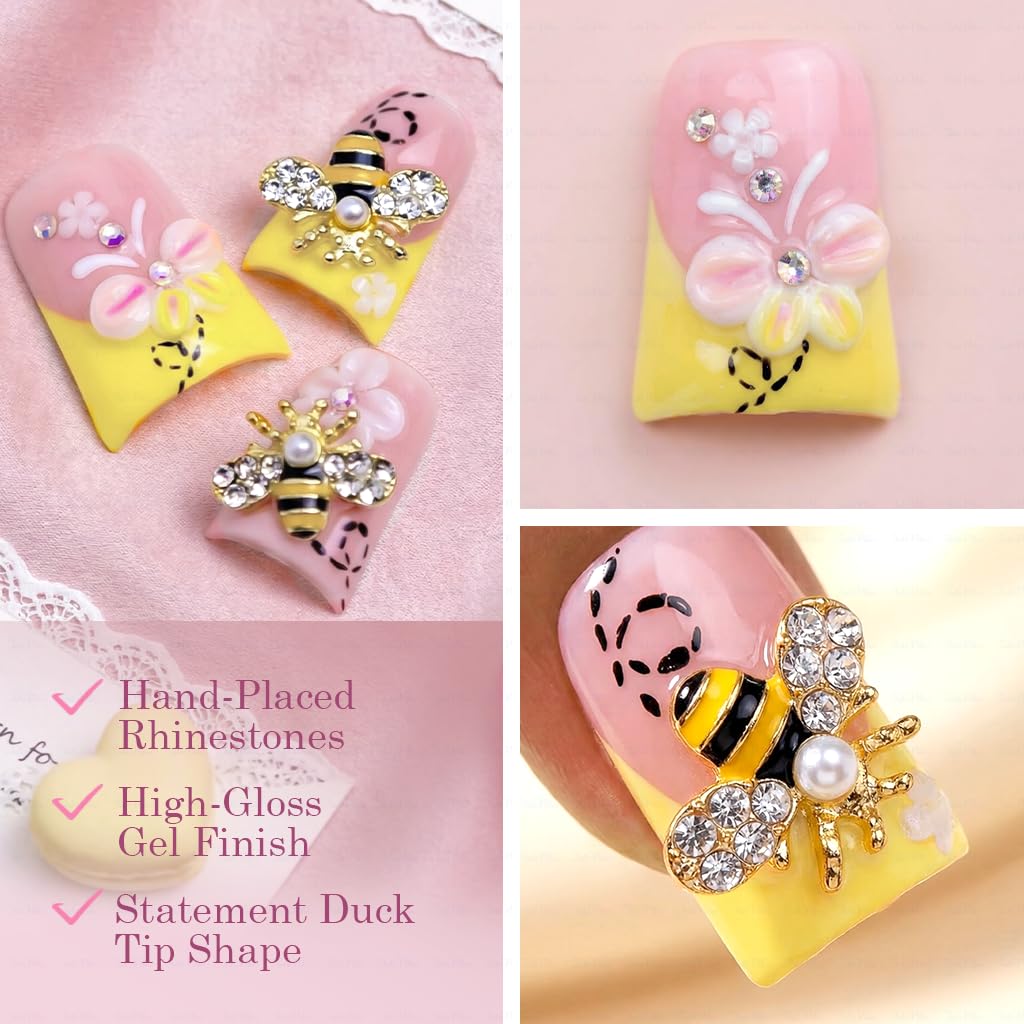IntoVibes floral bee charms nails offer playful decorative detail.