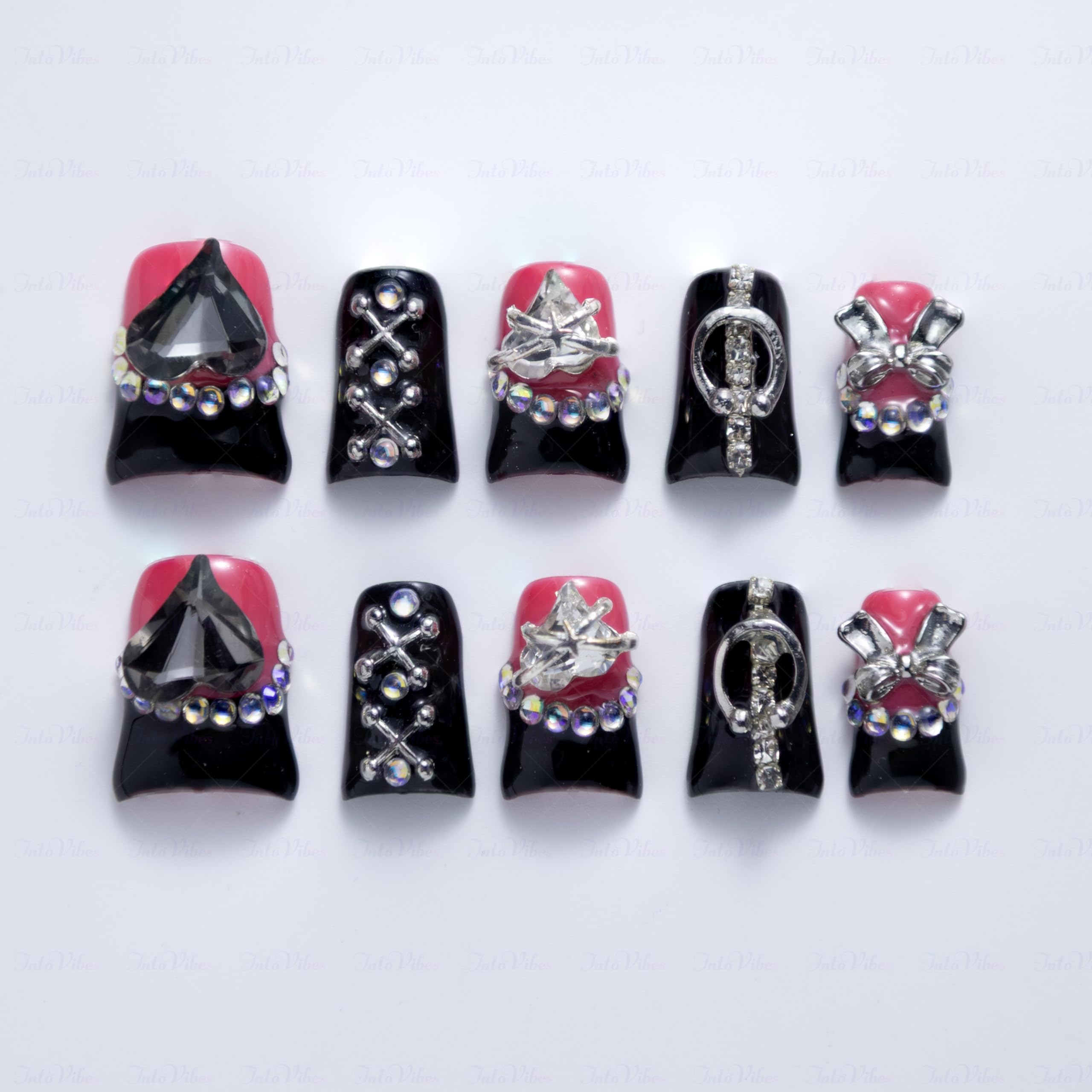 IntoVibes punk metal accents add edgy detail for party-ready nails.