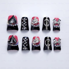 IntoVibes punk metal accents add edgy detail for party-ready nails.