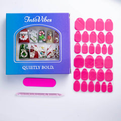 IntoVibes Christmas decor themed nails with Santa and tree accents.