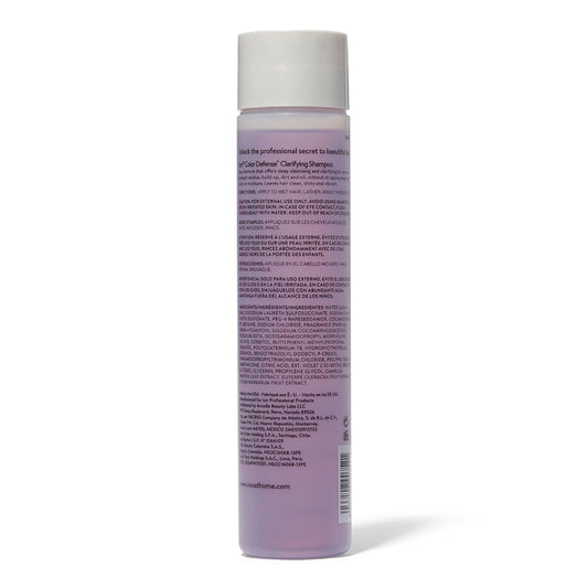 Ion Color Defense Clarifying Shampoo bottle close-up, vegan formula for color-treated hair.