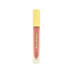 IRIS&ROMEO lip balm being applied for lightweight tint and SPF protection.