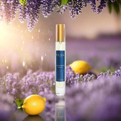 ISAK Lavender Rain cap and spray illustrate easy application and long-lasting scent throughout the day.