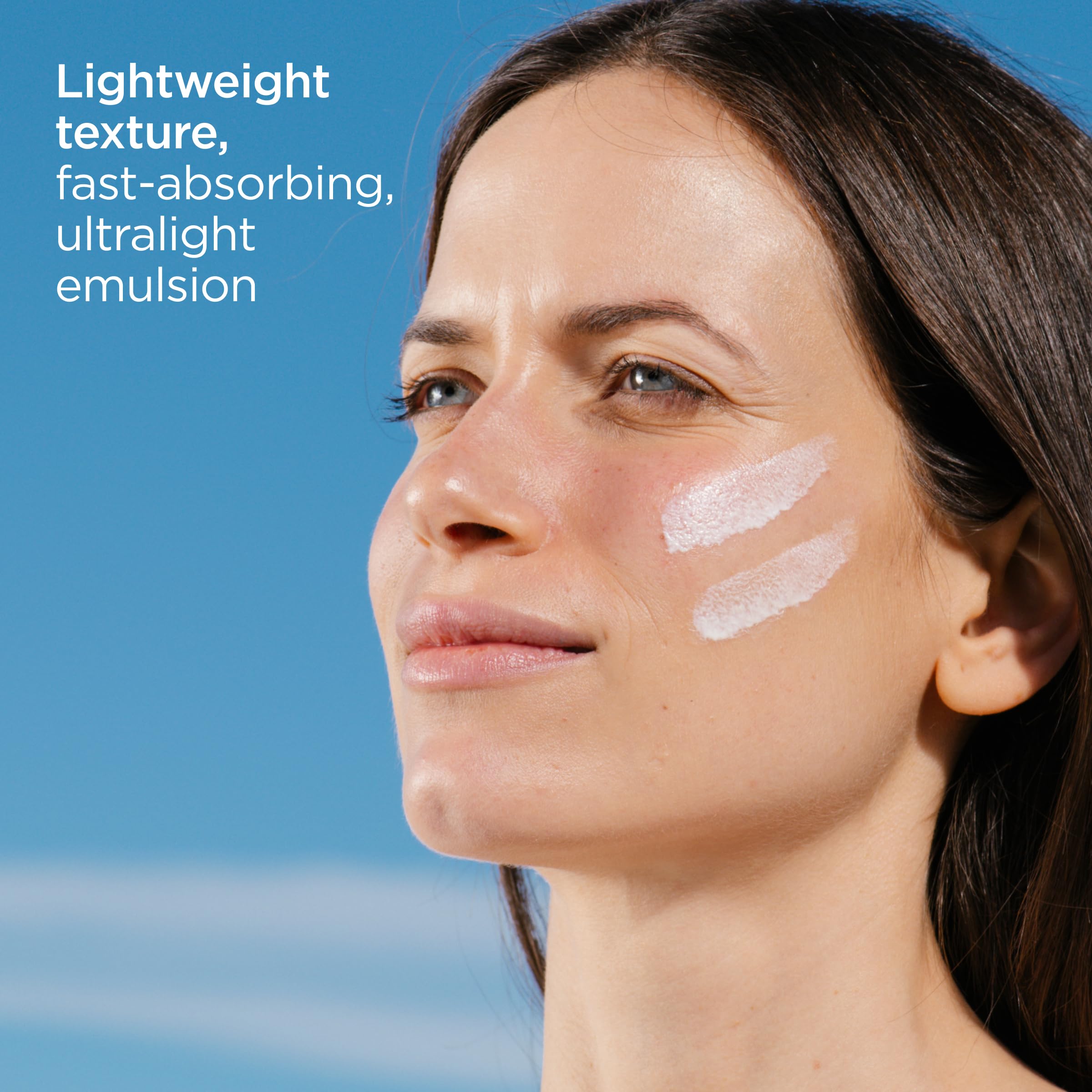 Travel-size bottle positioned for on-the-go skin protection