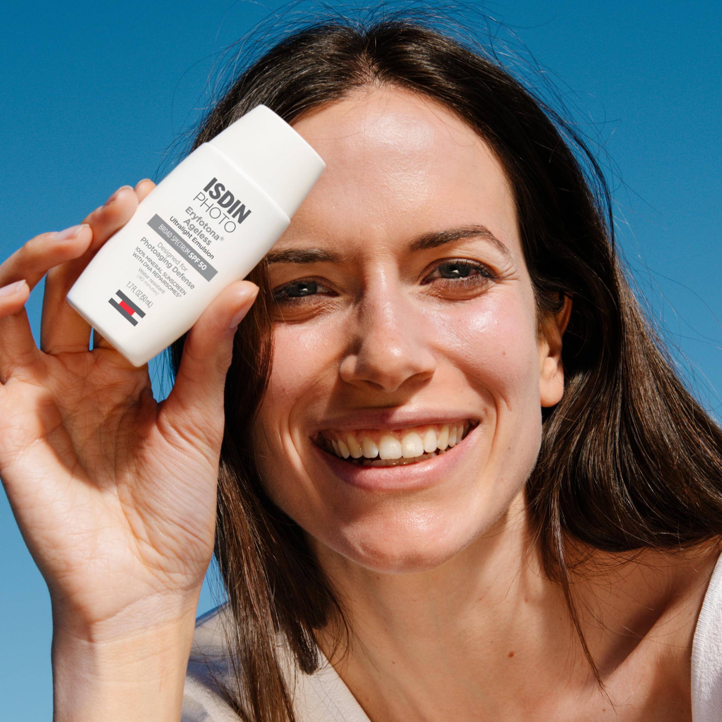 ISDIN Eryfotona Ageless tinted sunscreen being applied for a natural, seamless finish.