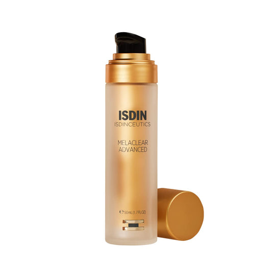 ISDIN Melaclear Advanced serum bottle on a vanity suggesting even skin tone